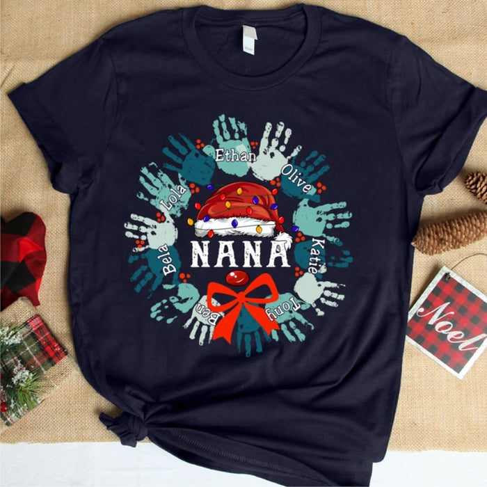 Personalized Christmas T-Shirt For Grandma Nana Santa Claus Lights And Handprint Printed Custom Grandkids Name