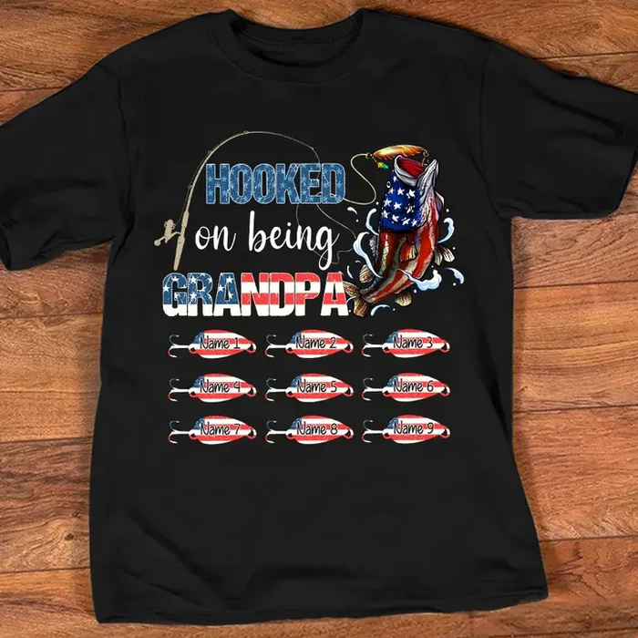 Personalized T-Shirt For Grandpa Hooked On Being Grandpa Fish And Rod American Flag Art Printed Custom Grandkids Name