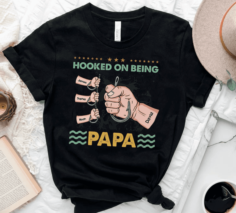 Personalized T-Shirt For Fishing Lovers To Grandpa Hooked On Being Papa Custom Grandkids Name Father's Day Shirt